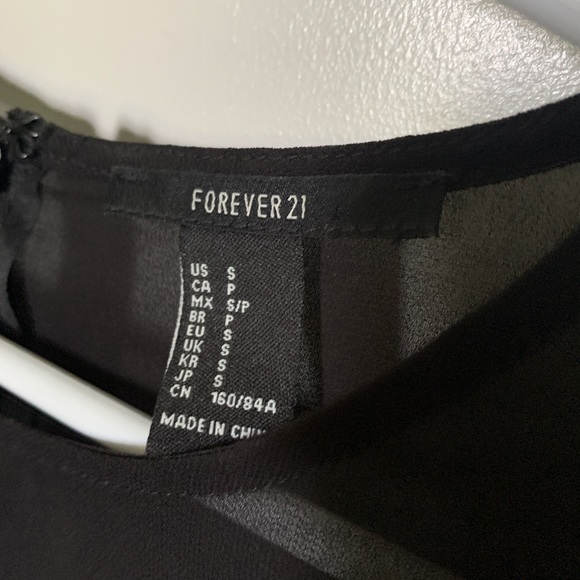 Sleeveless blouse - Picture 2 of 2